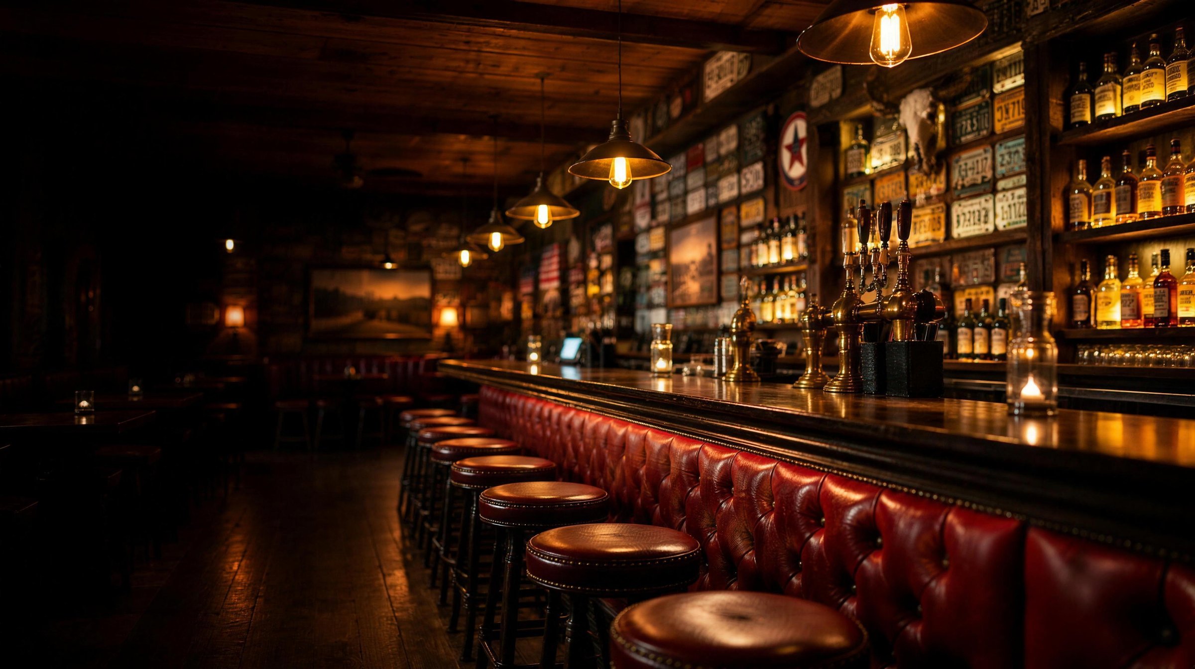The Route 33 bar — license-plate walls, red leather stools and warm saloon light